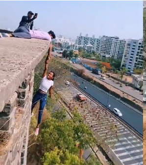 കെട്ടിടത്തിനു മുകളിൽ അപകടകരമായി തൂങ്ങിക്കിടന്ന് റീൽസ്; 23കാരിയും സുഹൃത്തും അറസ്റ്റിൽ